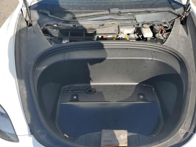 Photo 11 from auction – 2018 TESLA MODEL 3 with VIN 5YJ3E1EB9JF134040