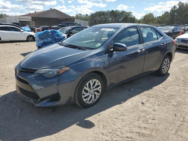 TOYOTA COROLLA L 2018 with VIN 5YFBURHE7JP810475 - Photo from auction