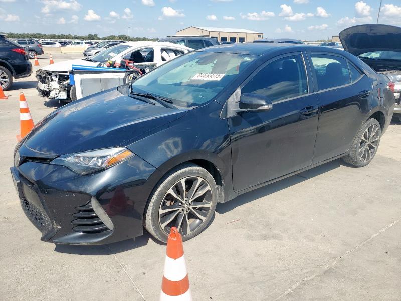TOYOTA COROLLA L 2017 with VIN 5YFBURHE1HP631052 - Photo from auction