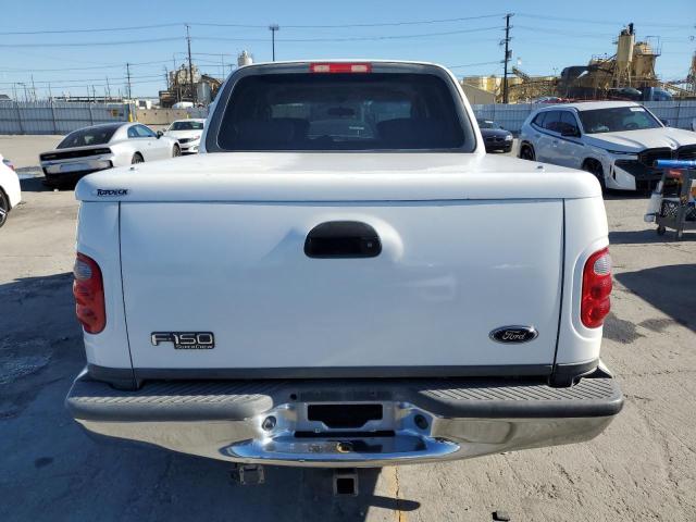 Photo 6 from auction – 2003 FORD F150 SUPER with VIN 1FTRW07693KD97944