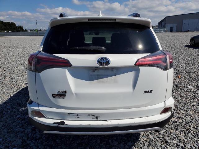 Photo 6 from auction – 2018 TOYOTA RAV4 with VIN JTMWFREV2JJ175671