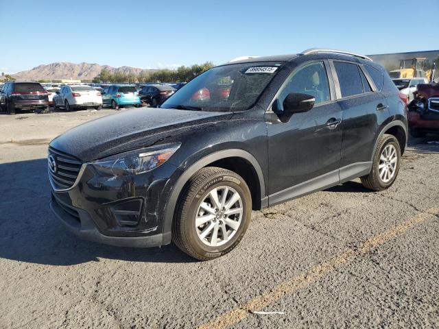 Photo 1 from auction – 2016 MAZDA CX-5 TOURI with VIN JM3KE4CYXG0881875