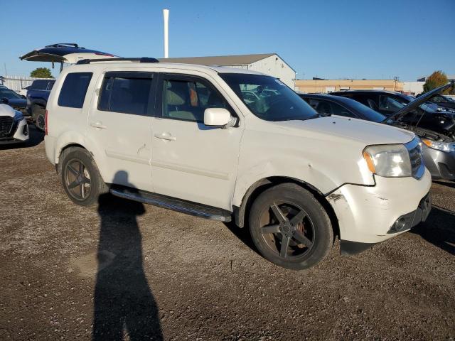 Photo 4 from auction – 2012 HONDA PILOT EXL with VIN 5FNYF4H50CB505809