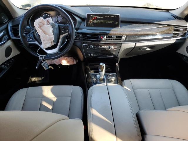 Photo 8 from auction – 2014 BMW X5 XDRIVE3 with VIN 5UXKR0C5XE0H21473