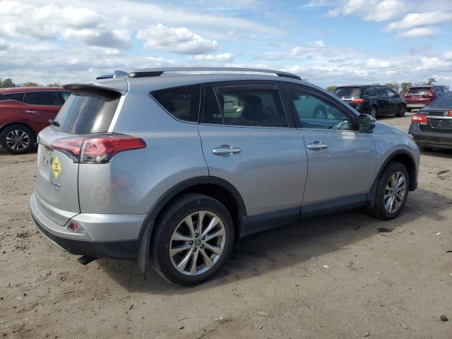 Photo 3 from auction – 2018 TOYOTA RAV4 LIMIT with VIN 2T3DFREV3JW762891
