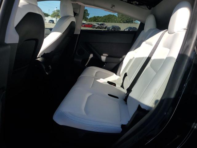 Photo 11 from auction – 2023 TESLA MODEL Y with VIN 7SAYGAEE8PF873194