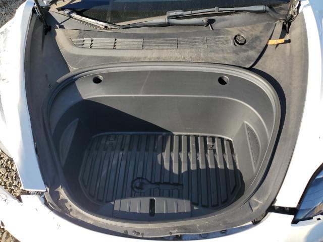 Photo 11 from auction – 2022 TESLA MODEL 3 with VIN 5YJ3E1EB5NF135109