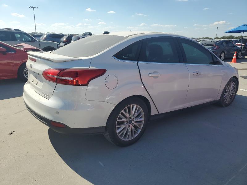 Photo 3 from auction – 2016 FORD FOCUS TITA with VIN 1FADP3J22GL406830