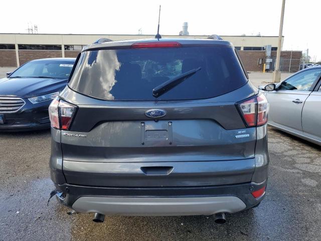Photo 6 from auction – 2018 FORD ESCAPE SE with VIN 1FMCU0GD8JUC27579