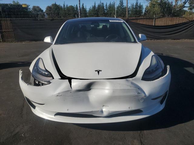 Photo 5 from auction – 2018 TESLA MODEL 3 with VIN 5YJ3E1EA0JF053855