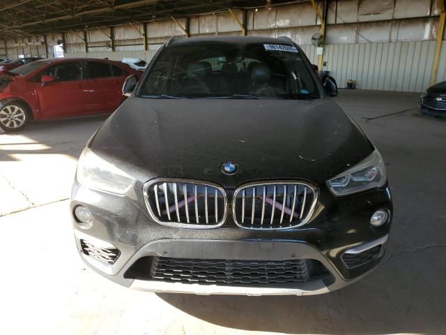 Photo 5 from auction – 2017 BMW X1 XDRIVE2 with VIN WBXHT3C31H5F73351