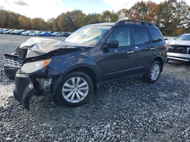 SUBARU FORESTER 2011 with VIN JF2SHADC8BH756001 - Photo from auction