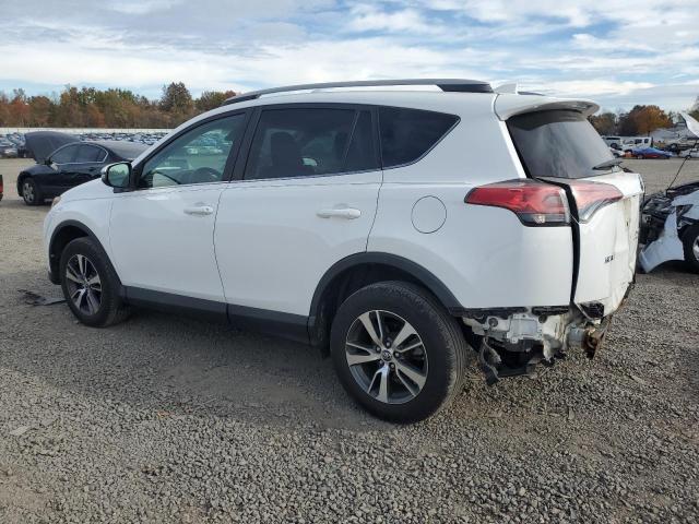 Photo 2 from auction – 2017 TOYOTA RAV4 XLE with VIN 2T3RFREVXHW663260