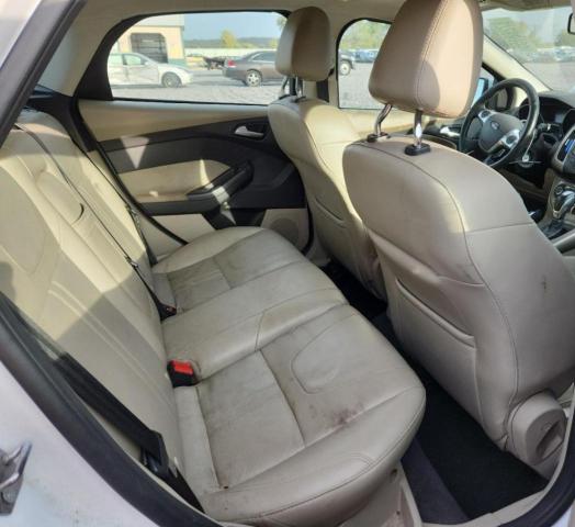 Photo 10 from auction – 2012 FORD FOCUS SEL with VIN 1FAHP3M24CL337758