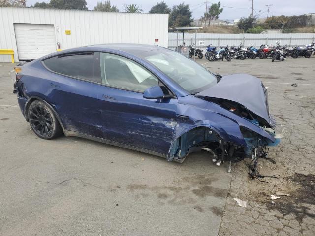 Photo 4 from auction – 2022 TESLA MODEL Y with VIN 7SAYGAEE0NF547354