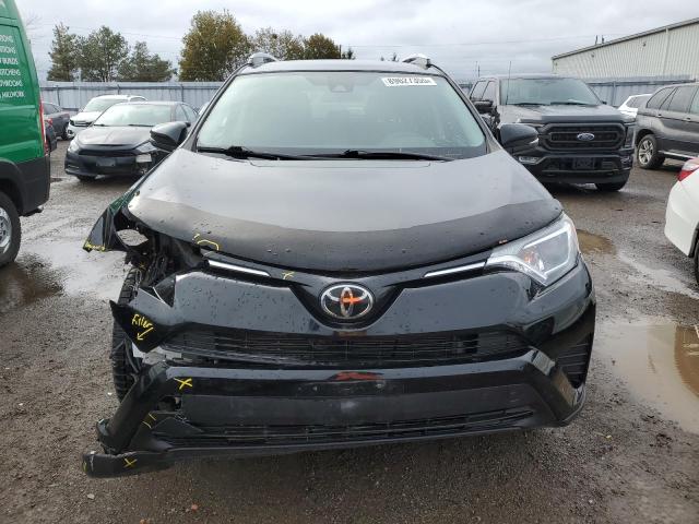 Photo 5 from auction – 2017 TOYOTA RAV4 LE with VIN 2T3BFREV6HW689081