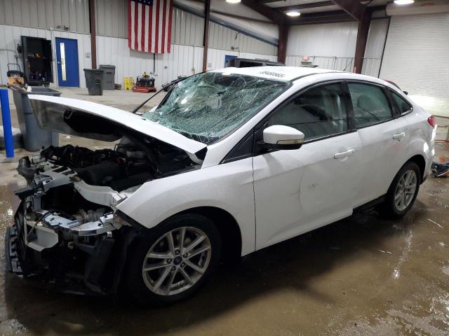 FORD FOCUS SE 2017 with VIN 1FADP3F21HL304929 - Photo from auction