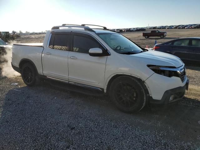Photo 4 from auction – 2017 HONDA RIDGELINE with VIN 5FPYK3F56HB004835