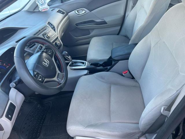 Photo 13 from auction – 2012 HONDA CIVIC LX with VIN 2HGFB2F52CH594370