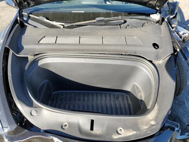 Photo 11 from auction – 2023 TESLA MODEL Y with VIN 7SAYGAEE4PF902660