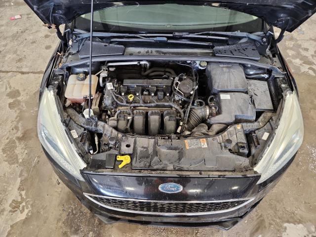 Photo 11 from auction – 2015 FORD FOCUS S with VIN 1FADP3E20FL258654