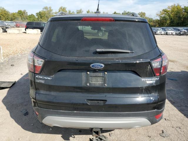 Photo 6 from auction – 2018 FORD ESCAPE TIT with VIN 1FMCU9J95JUD09939