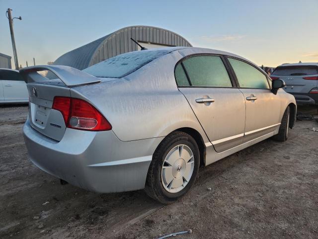 Photo 3 from auction – 2006 HONDA CIVIC HYBR with VIN JHMFA36236S022202
