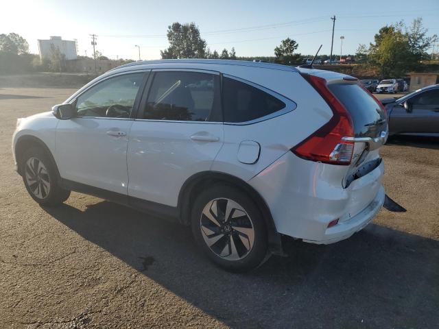 Photo 2 from auction – 2016 HONDA CR-V TOURI with VIN 5J6RM4H97GL100069