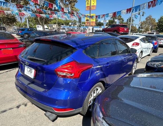 Photo 4 from auction – 2015 FORD FOCUS SE with VIN 1FADP3K20FL357902