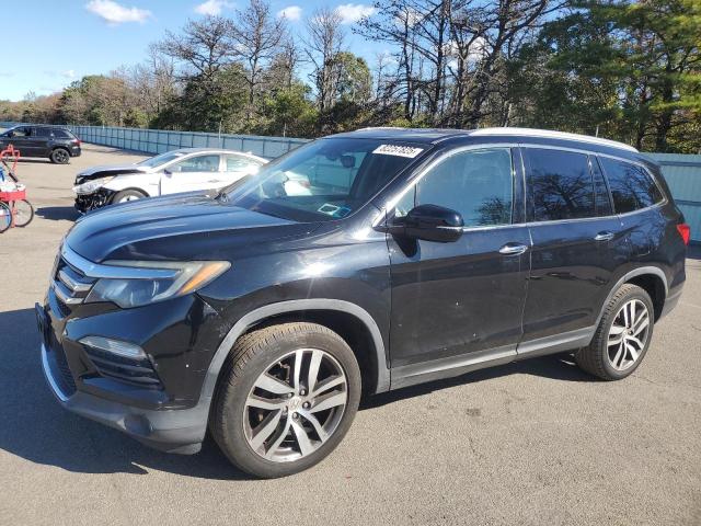 HONDA PILOT ELIT 2016 with VIN 5FNYF6H03GB023891 - Photo from auction