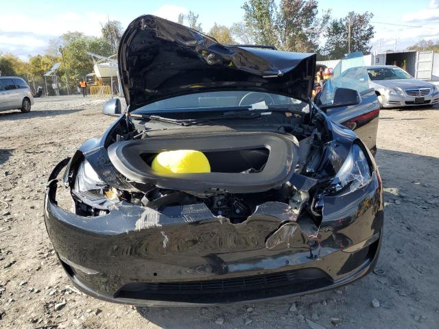 Photo 5 from auction – 2022 TESLA MODEL Y with VIN 7SAYGDEF9NF457730