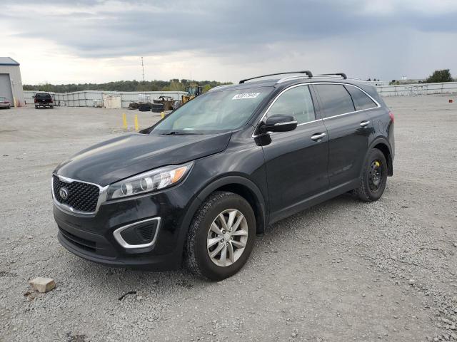 KIA SORENTO LX 2016 with VIN 5XYPG4A34GG092969 - Photo from auction