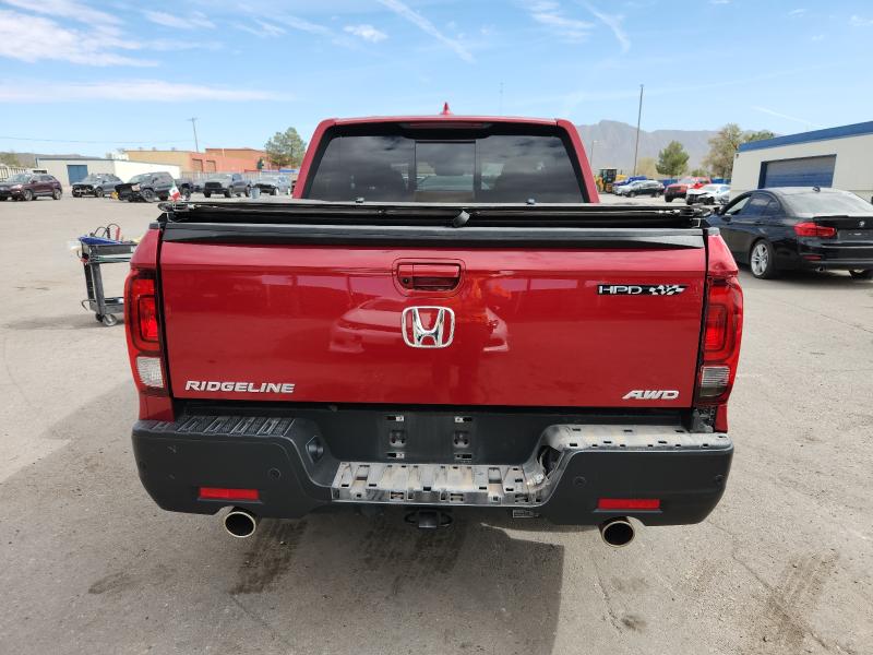 Photo 6 from auction – 2022 HONDA RIDGELINE with VIN 5FPYK3F70NB015665