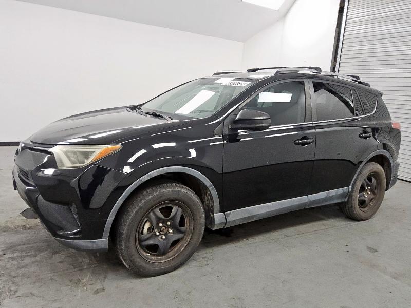 TOYOTA RAV4 LE 2016 with VIN 2T3ZFREV2GW251798 - Photo from auction