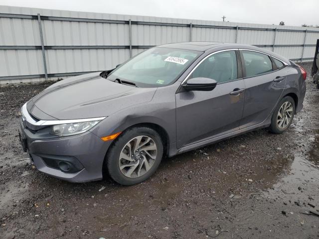 HONDA CIVIC EX 2016 with VIN 19XFC2F83GE087470 - Photo from auction