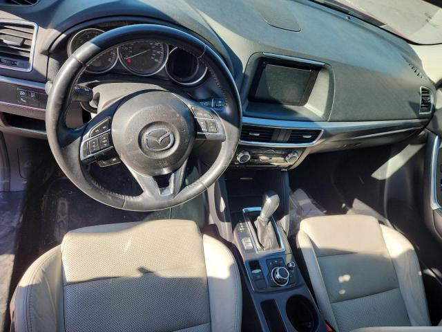 Photo 8 from auction – 2016 MAZDA CX-5 GT with VIN JM3KE2DYXG0911170