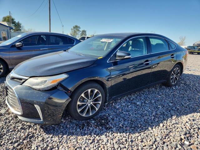 TOYOTA AVALON XLE 2016 with VIN 4T1BK1EB5GU202415 - Photo from auction