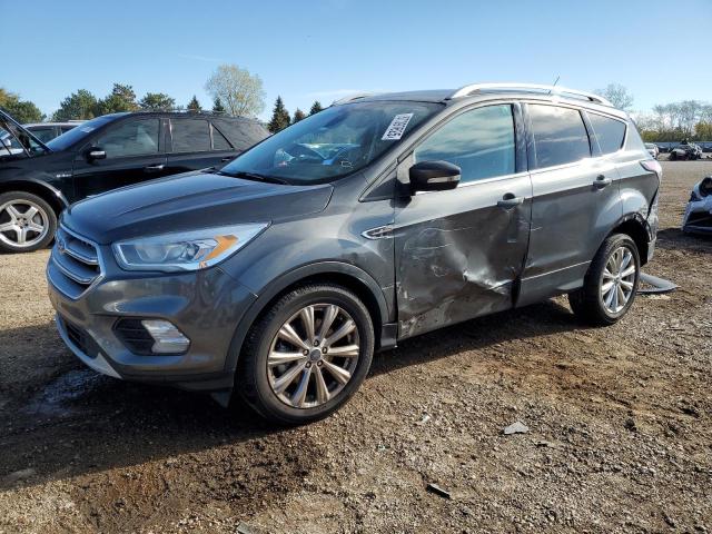 FORD ESCAPE TIT 2017 with VIN 1FMCU9J95HUA63792 - Photo from auction