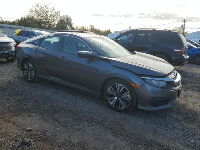 Photo 4 from auction – 2016 HONDA CIVIC with VIN 2HGFC1F34GH643452