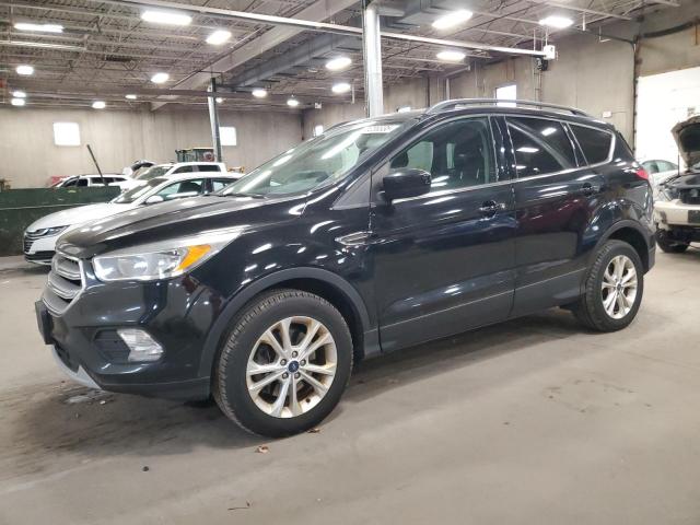 FORD ESCAPE SE 2018 with VIN 1FMCU9GD5JUA85387 - Photo from auction