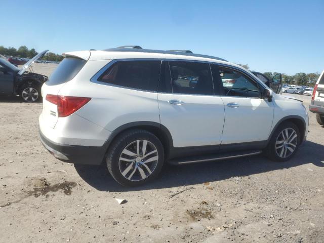 Photo 3 from auction – 2016 HONDA PILOT TOUR with VIN 5FNYF6H97GB042572
