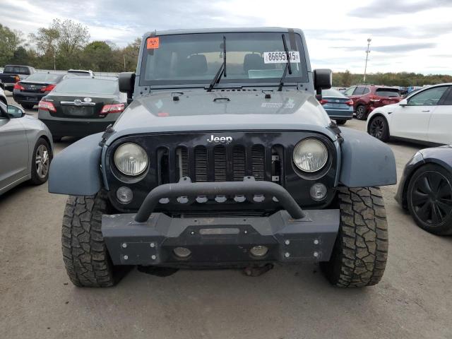 Photo 5 from auction – 2014 JEEP WRANGLER U with VIN 1C4BJWDG1EL311412