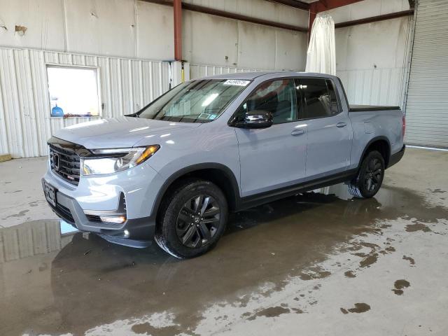 HONDA RIDGELINE 2023 with VIN 5FPYK3F15PB046988 - Photo from auction