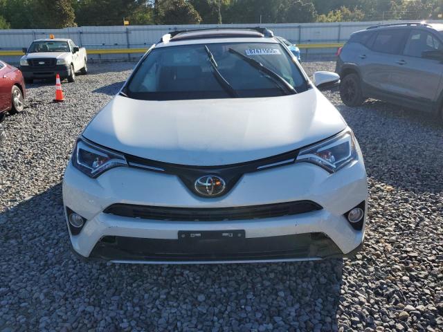 Photo 5 from auction – 2018 TOYOTA RAV4 LIMIT with VIN 2T3YFREV7JW461283