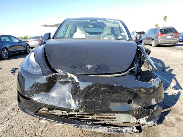 Photo 5 from auction – 2023 TESLA MODEL Y with VIN 7SAYGAEE4PF902660