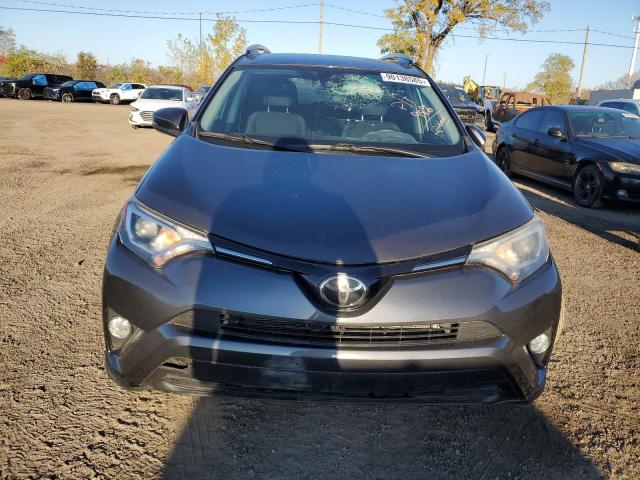Photo 5 from auction – 2018 TOYOTA RAV4 LE with VIN 2T3BFREV2JW776899