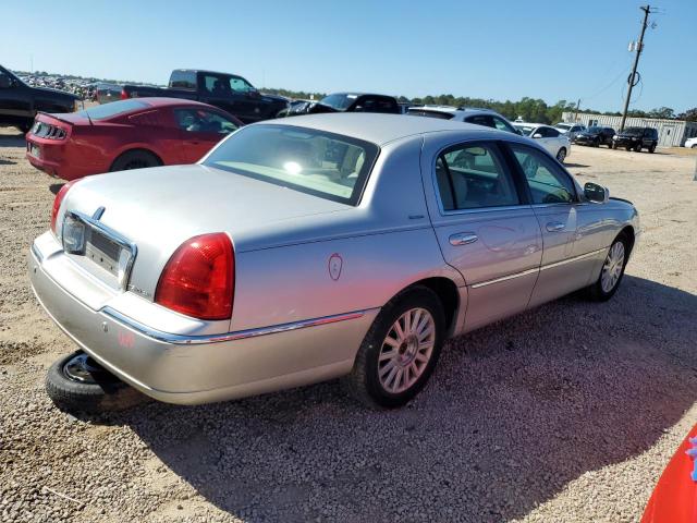 Photo 3 from auction – 2004 LINCOLN TOWN CAR E with VIN 1LNHM81W54Y632830