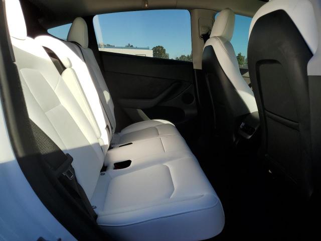 Photo 11 from auction – 2023 TESLA MODEL Y with VIN 7SAYGDEEXPF622551