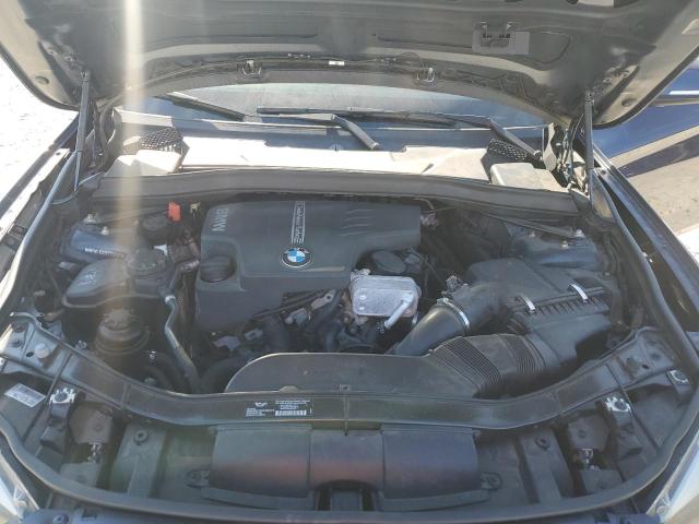 Photo 11 from auction – 2014 BMW X1 XDRIVE2 with VIN WBAVL1C53EVY19747