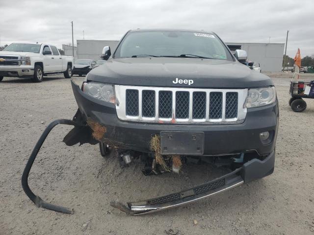Photo 5 from auction – 2013 JEEP GRAND CHER with VIN 1C4RJFCG5DC524412